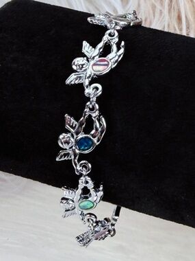 Vintage Silvertone angel linked tennis bracelet